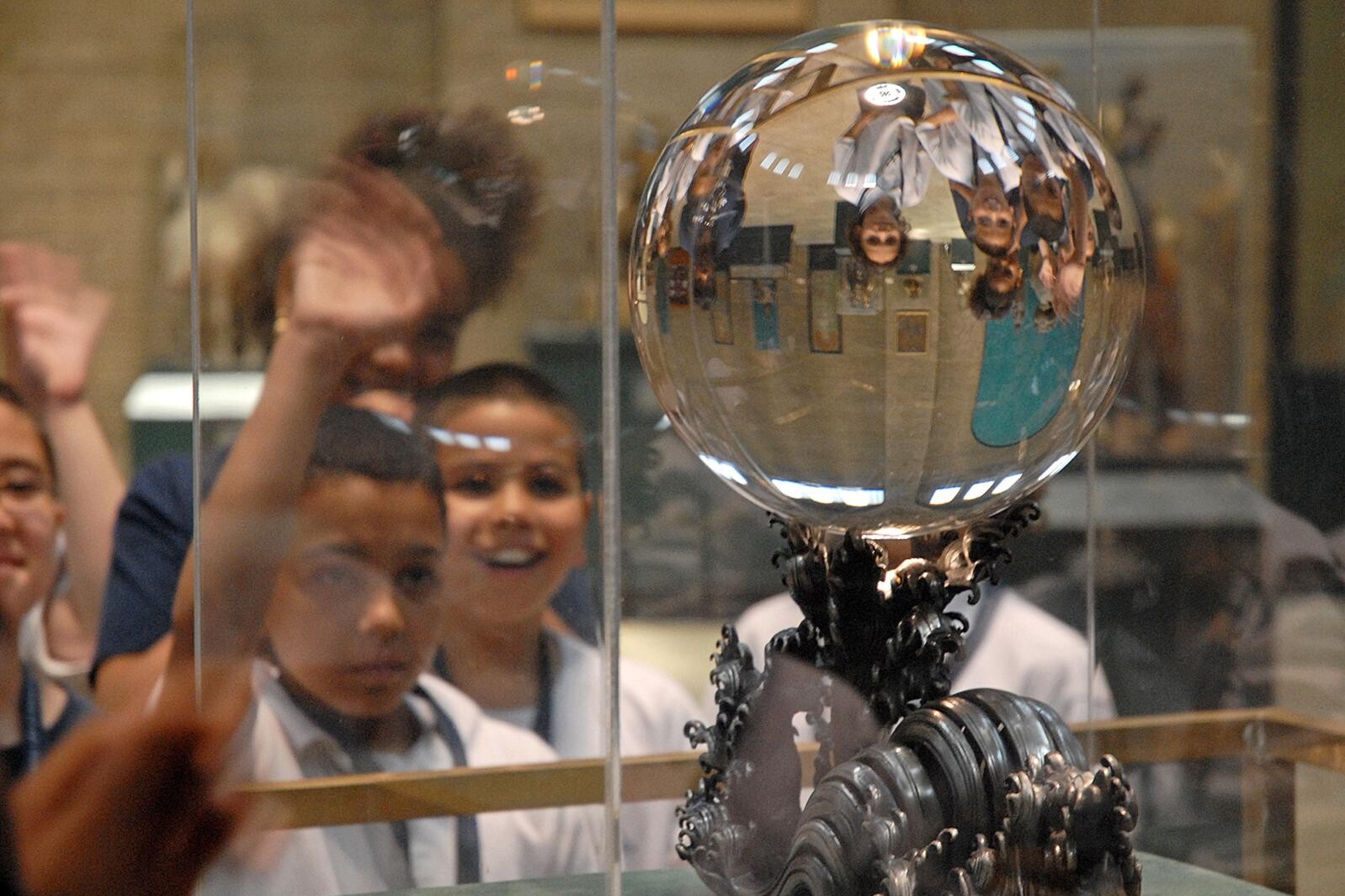 students viewing the penn museum crystal ball