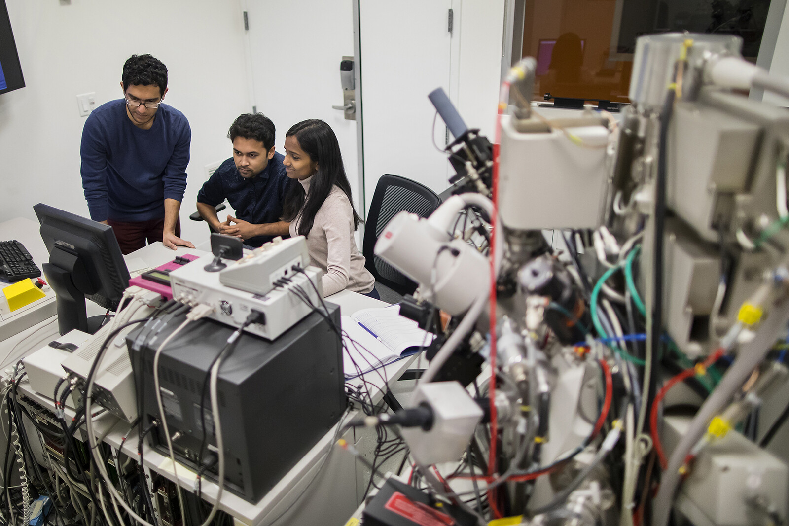 nanopores desalination lab with three graduate students