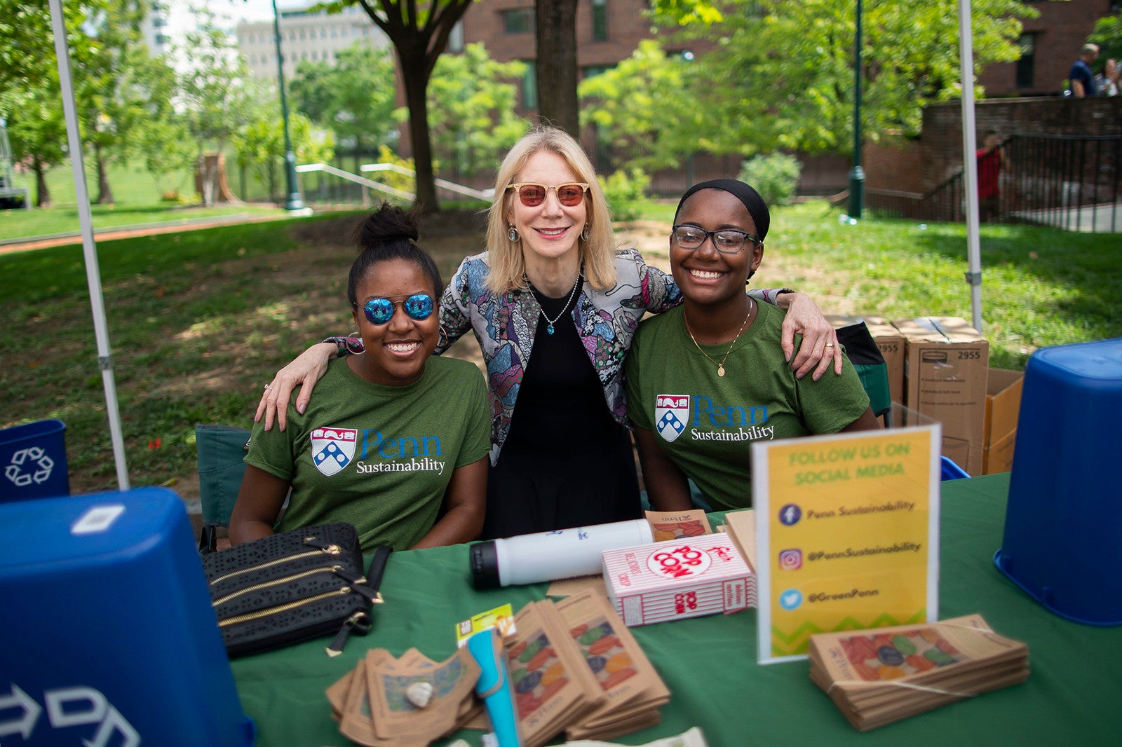 Penn President Amy Gutmann with two student volunteers during Move-In Green 2018