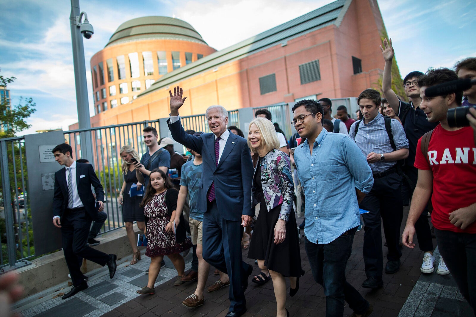 biden walks on locust walk with penn president amy gutmann