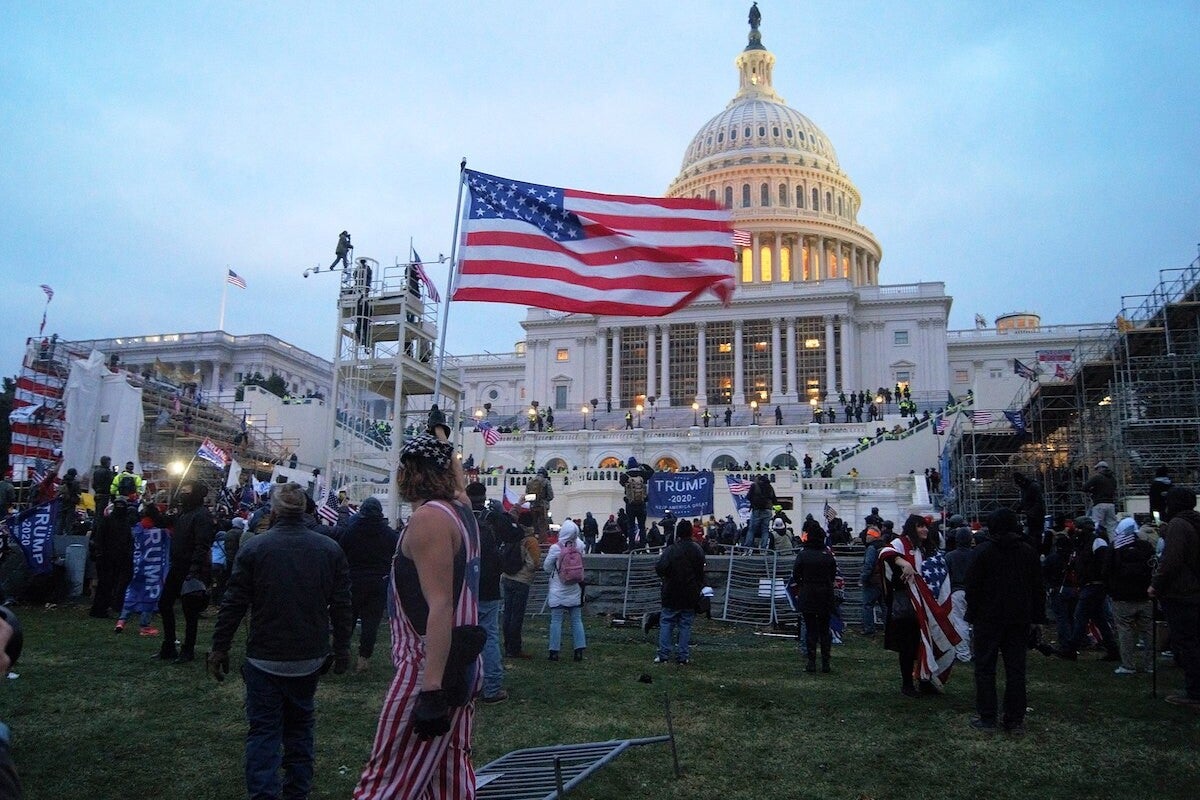 capitol siege with flag