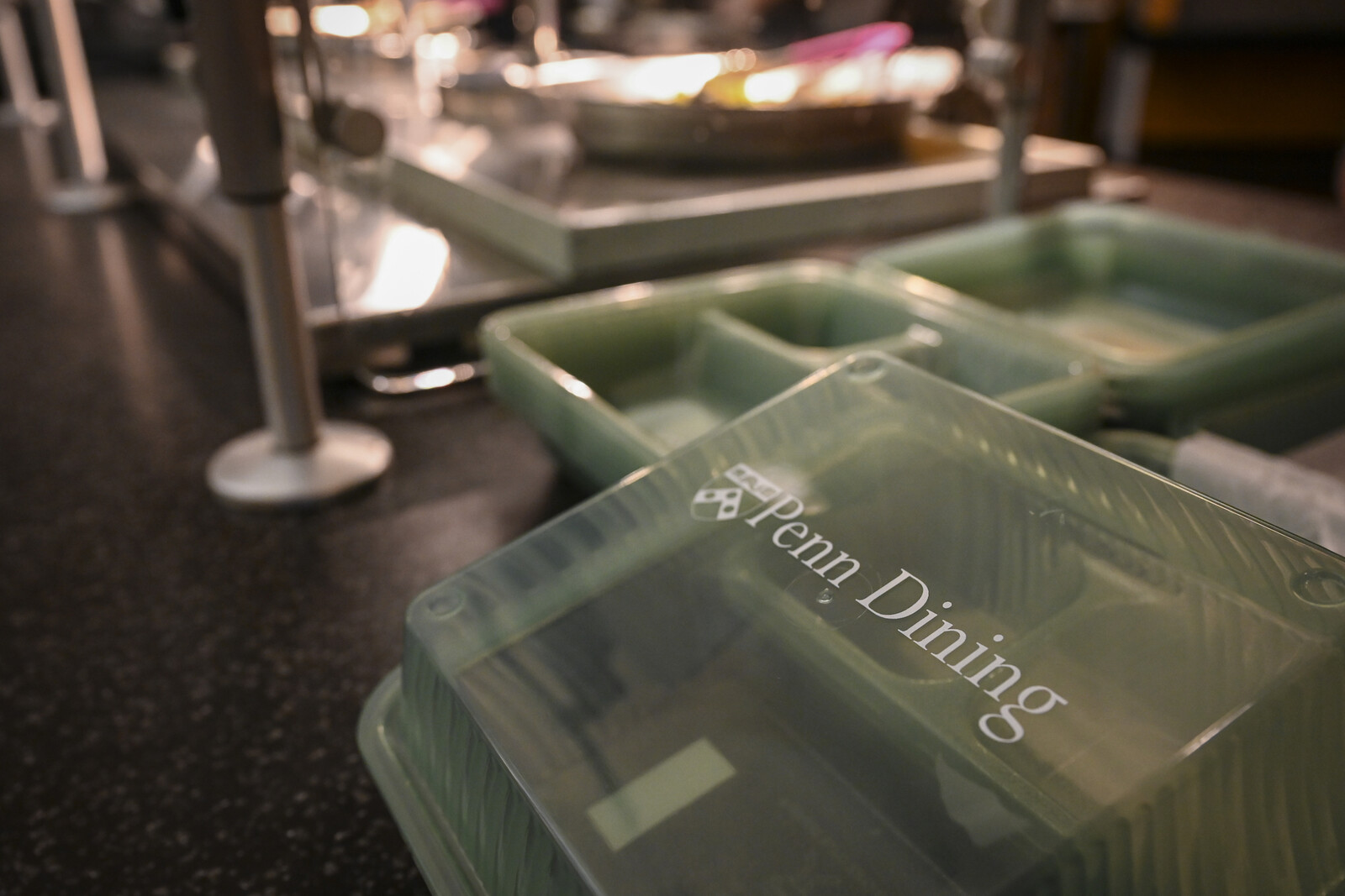 penn dining green containers