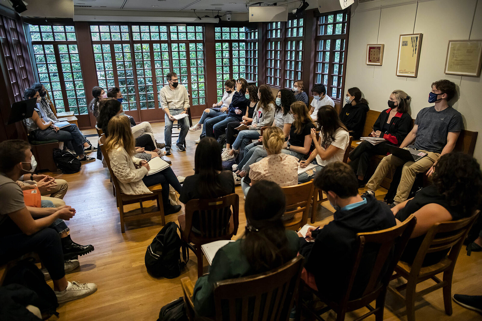 Al Filreis engaged in a discussion with students at a packed Kelly Writers House