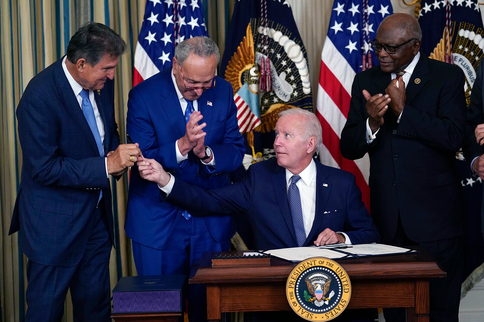 biden signing inflation reduction act