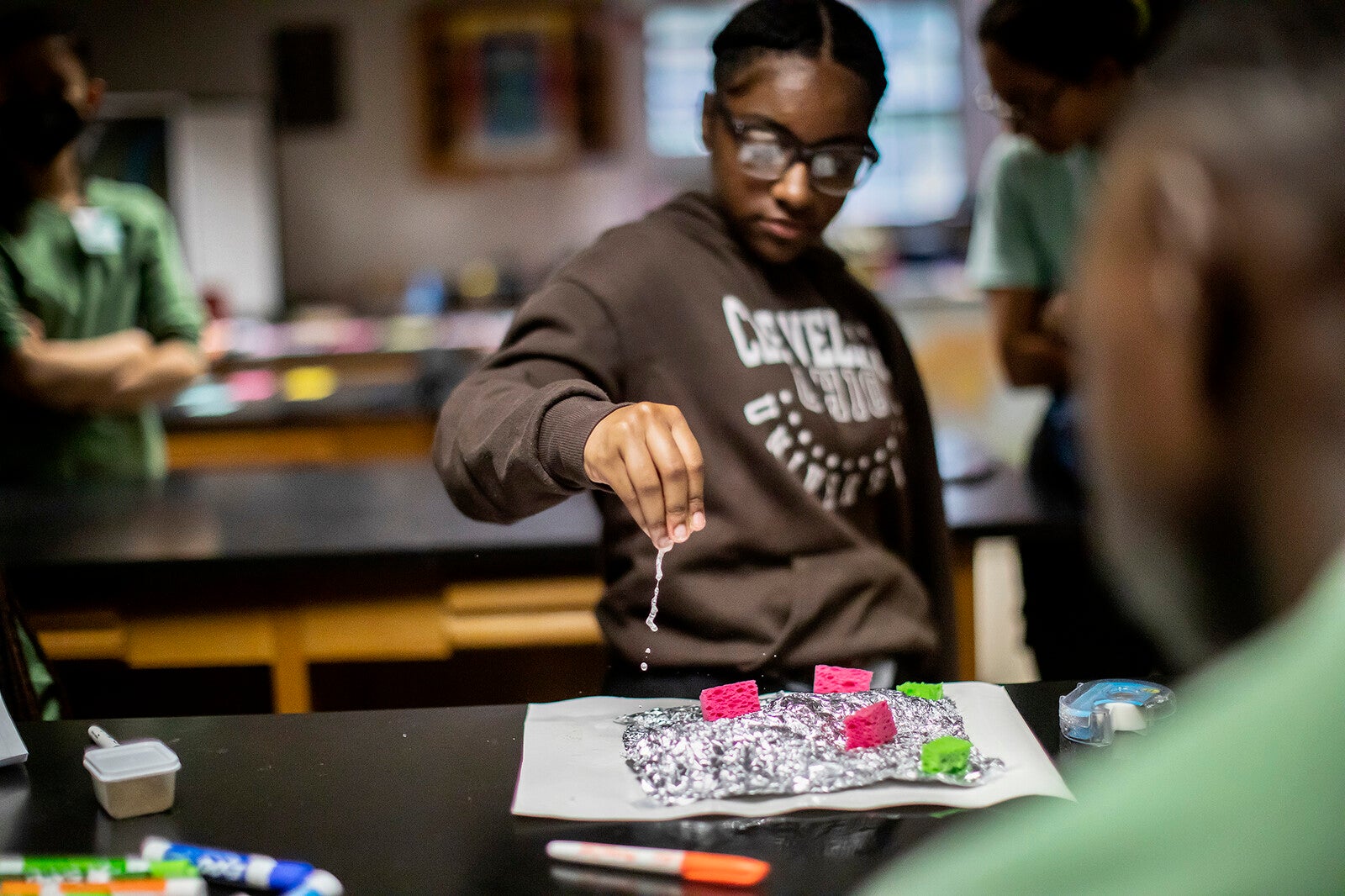 Students from Paul Robeson High School engaged in a hands-on lesson about water quality and hydrology at the Cobbs Creek Community Environmental Education Center. 