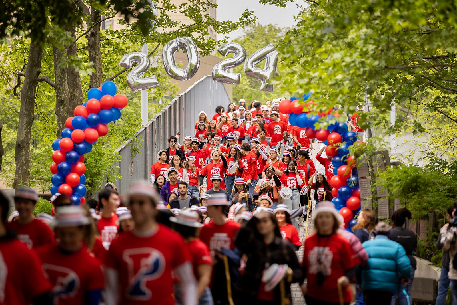 penn students cross the 38th street bridge during hey day