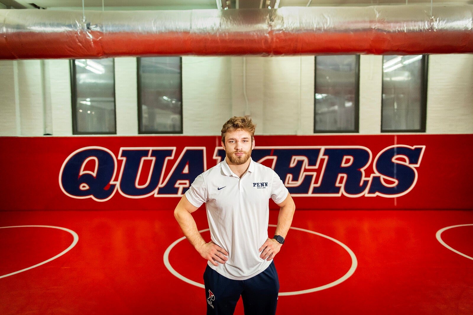 adam thomson wrestling on the mat