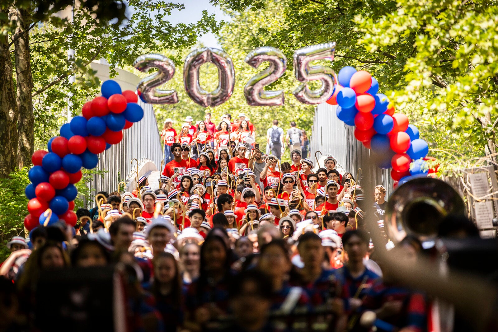 students walking over 38th street bridge during hey day