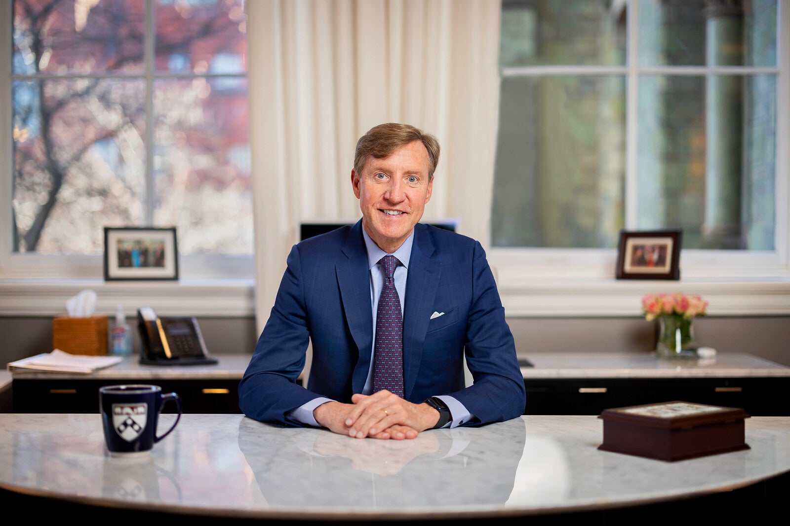 president jameson sitting at desk