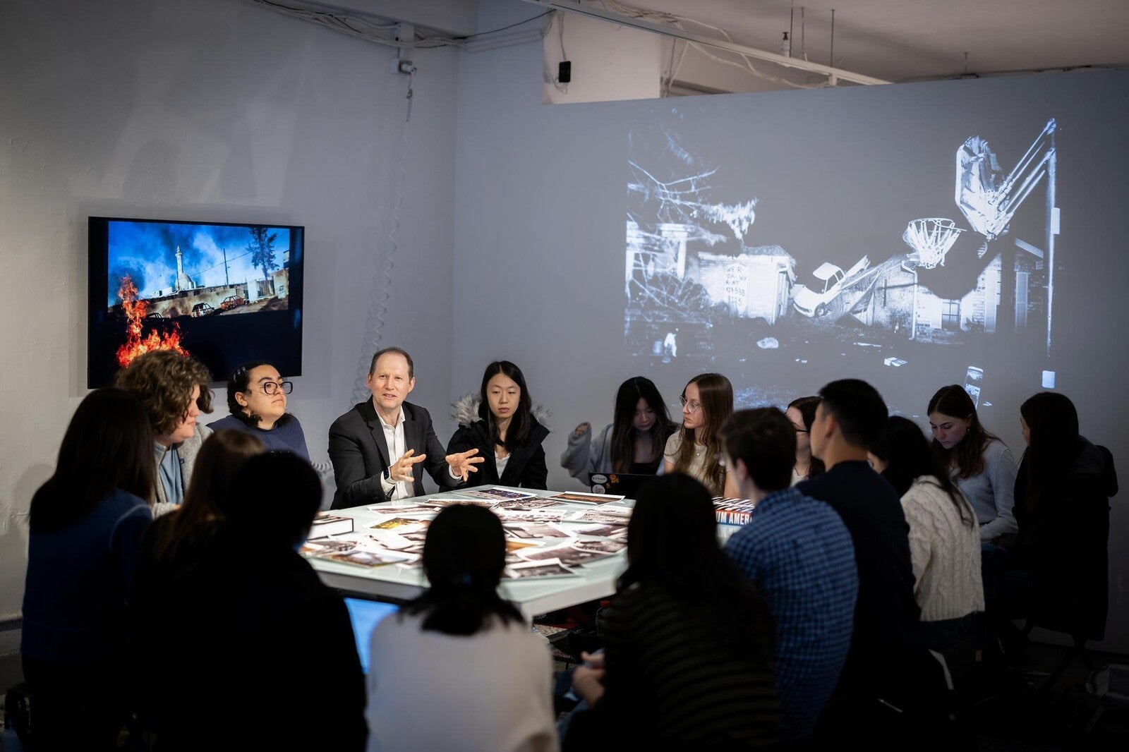 literature class, students sitting at a large table