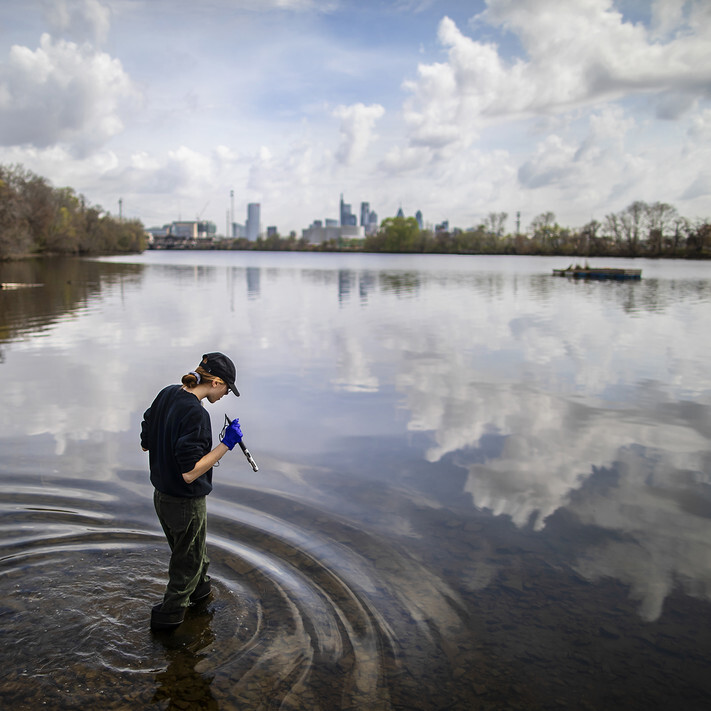 Penn student conducting research on mussel health in the Schuylkill River