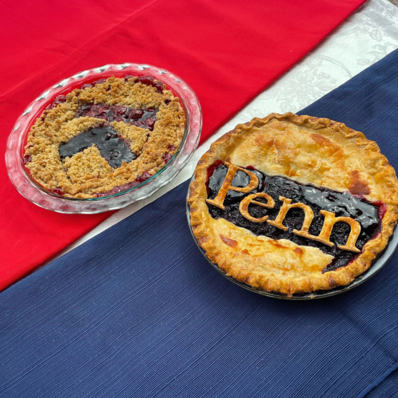 Two pies baked with Penn logos on them