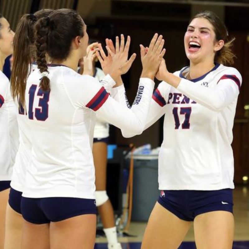Penn Volleyball players celebrating scoring